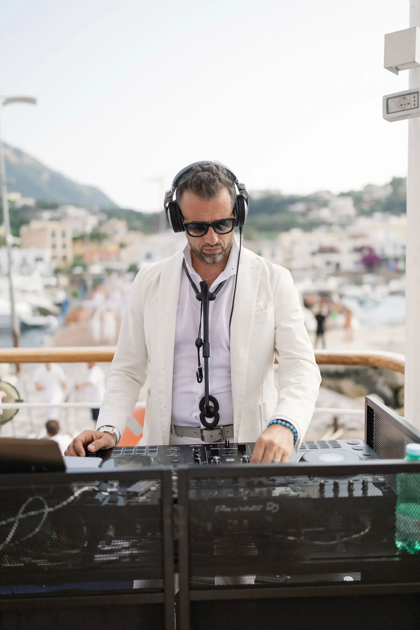 DJ Guinness at the console during a seaside event