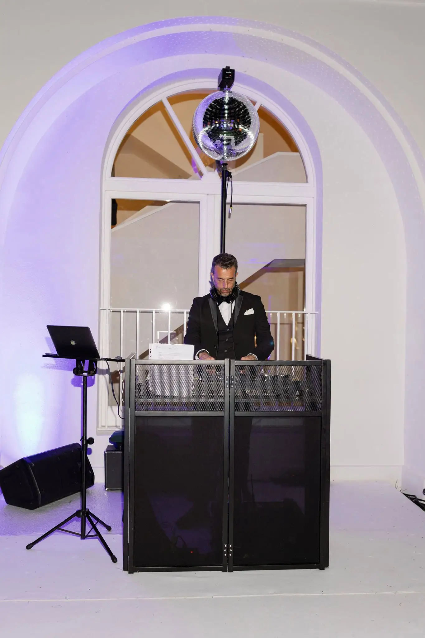 DJ Guinness · console · evening event in an exclusive venue
